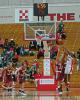 Nikkia Smith shoots over the outstretched arms of BC's Kristen Doherty